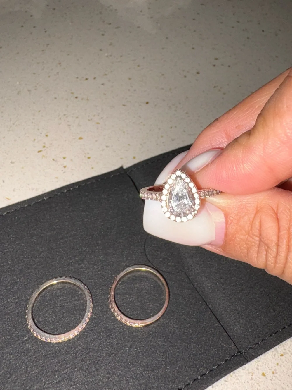 Pear-Shaped Halo Ring with Clear Cubic Stones in Silver